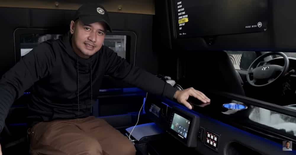 JM de Guzman shows off his luxurious van with bed, TV, cooler and closet (Screengrab from JM de Guzman's YouTube channel)