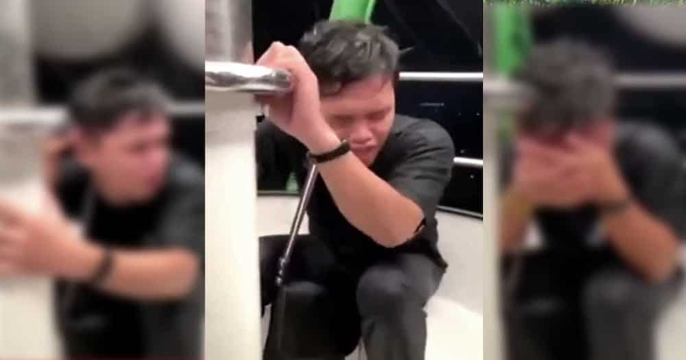 Video ng binatang inabot ng malakas na ulan habang sakay sa malaking ferris wheel sa Enchanted Kingdom, viral