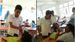 WATCH: Male student assaults teen girl; how their classmates react will make you angry!
