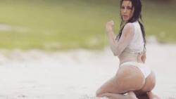 Watch Kim Kardashian twerk in a tight black thong!