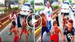 This Pinoy car passenger in Cebu danced with hilarious street children while stuck in heavy traffic!