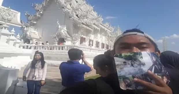 Boyfriend brings girlfriend's pictures to Thailand even after she died