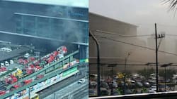 Mall goers shocked as fire raised to 2nd alarm hits Trinoma Mall in QC
