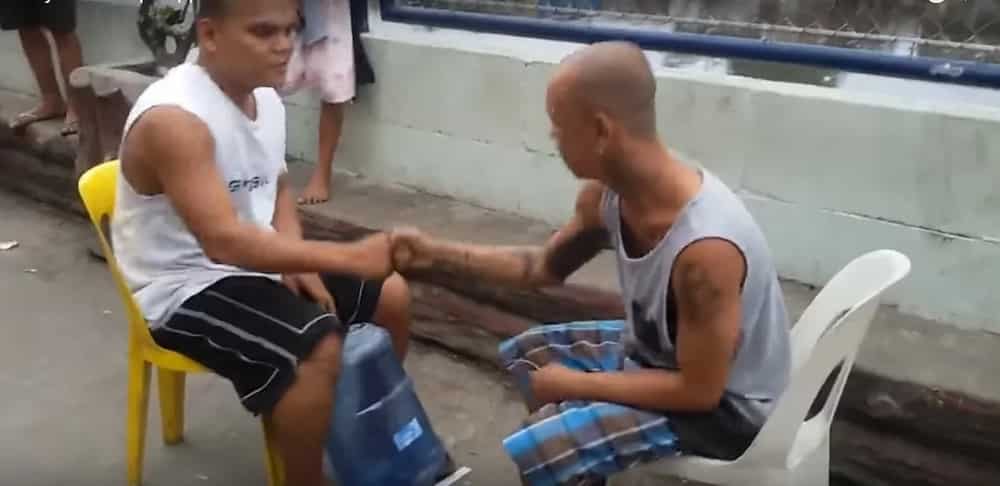 Viral video reveals epic punishment for 'jak en poy' game Viral video reveals epic punishment for 'jak en poy' game