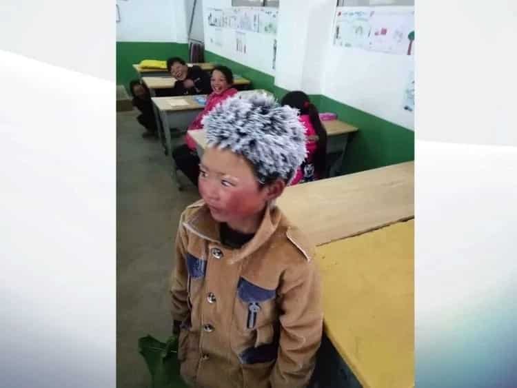 More than $15,300 in donations for viral "Ice Boy" with frozen hair