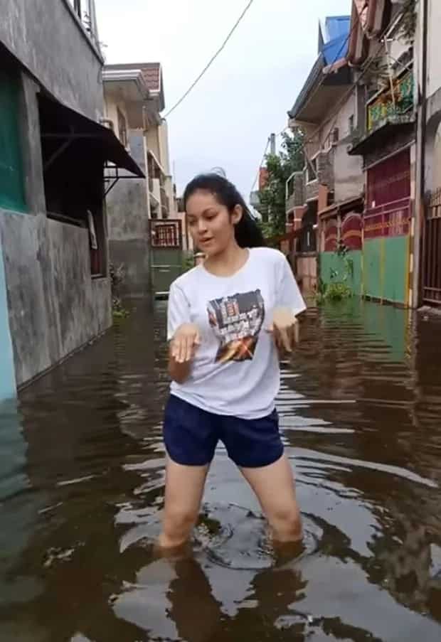 Nag-viral ang trip ni ate na sumayaw ng 'Boom Boom' sa malalim na tubig-baha