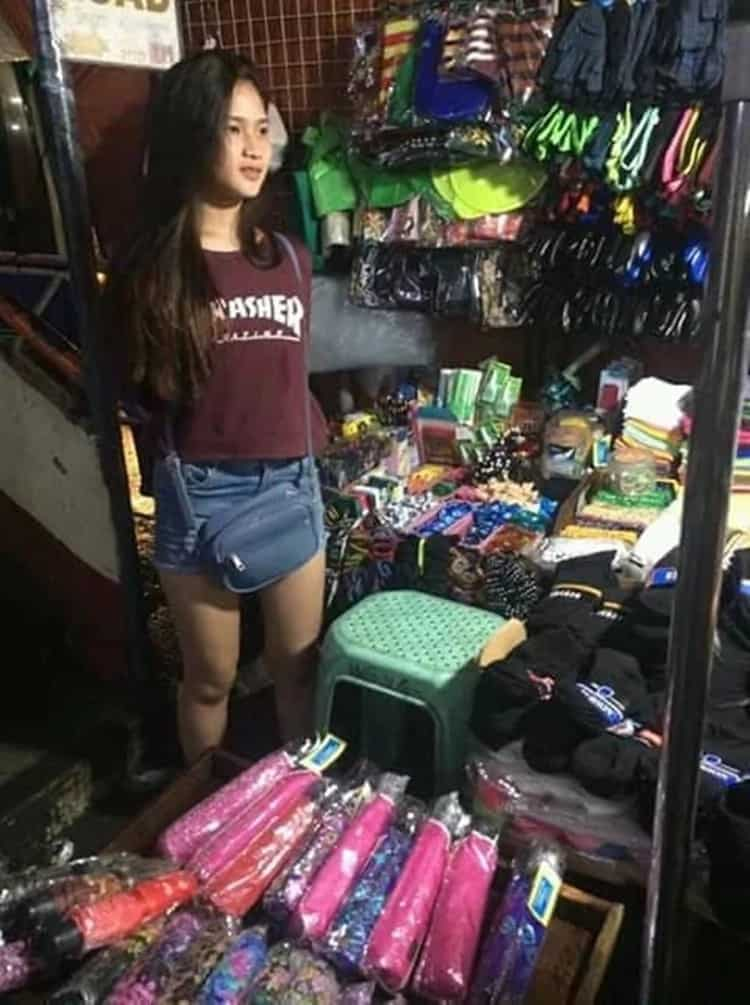 'Payong girl' near Farmer's Mall Cubao goes viral for being a certified headturner