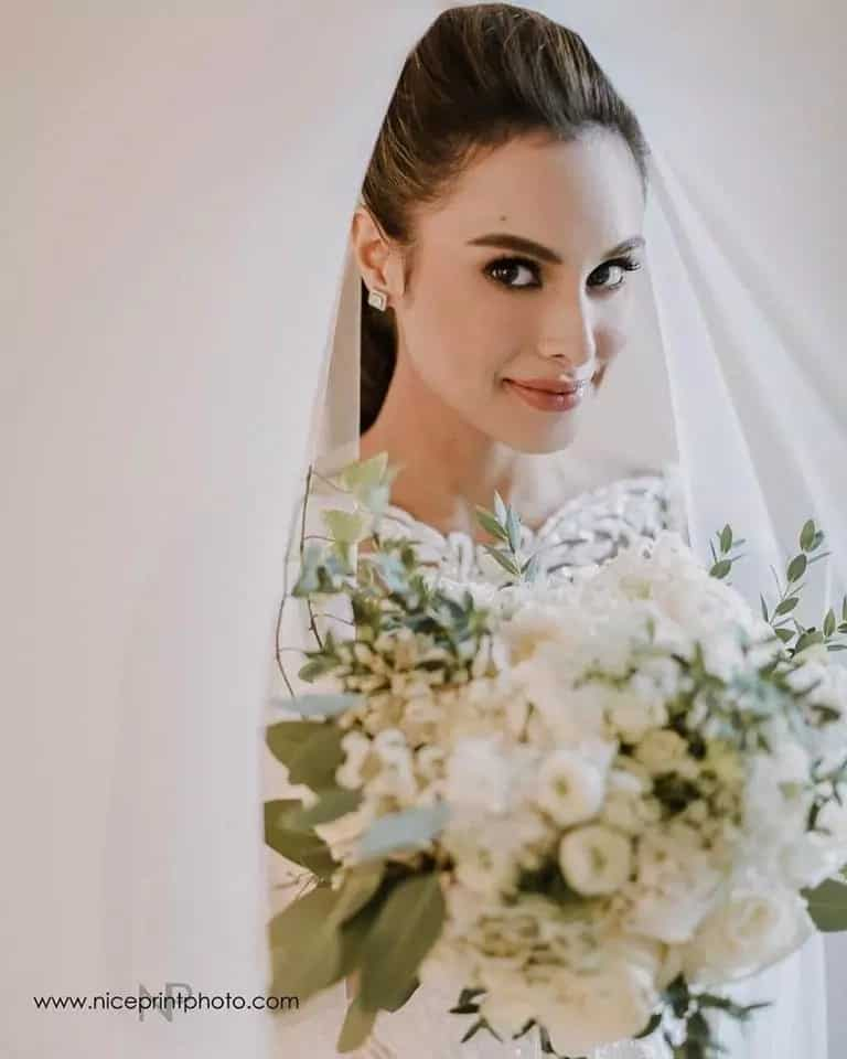 Max Collins wows guests in her Francis Libiran wedding gown