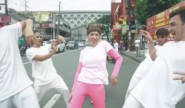 Ai-ai Delas Alas dances on the street with a crew