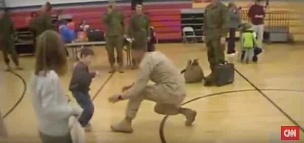 A boy with cerebral palsy walks to his Marine dad for the first time after not seeing him in over a year!