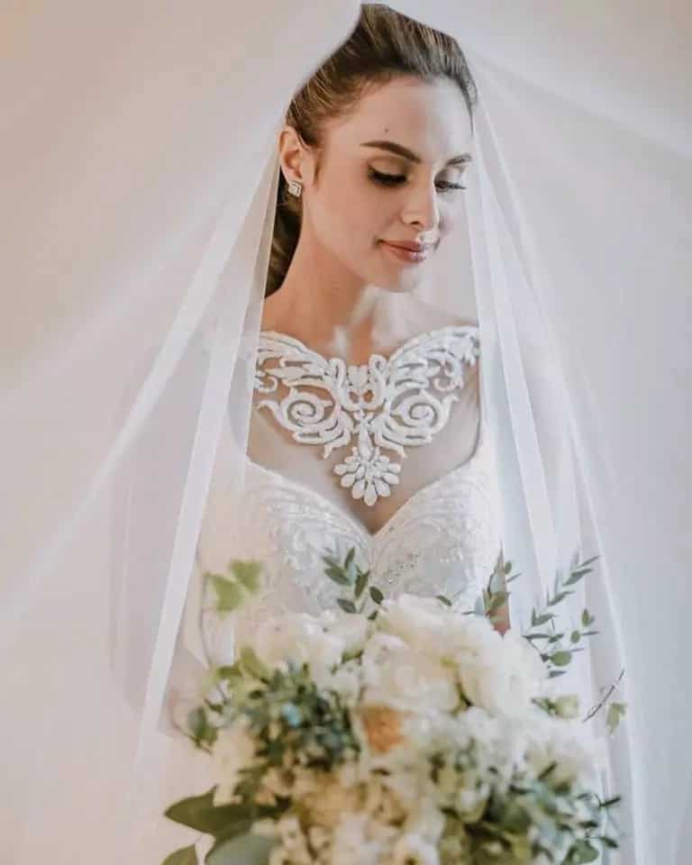 Max Collins wows guests in her Francis Libiran wedding gown