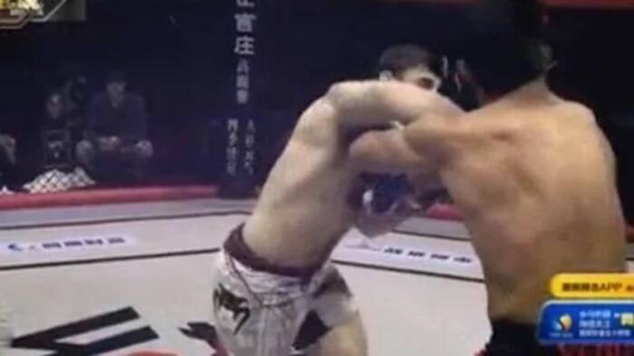 MMA Fighter Cheap Shots His Opponent With A Fake Glove Touch