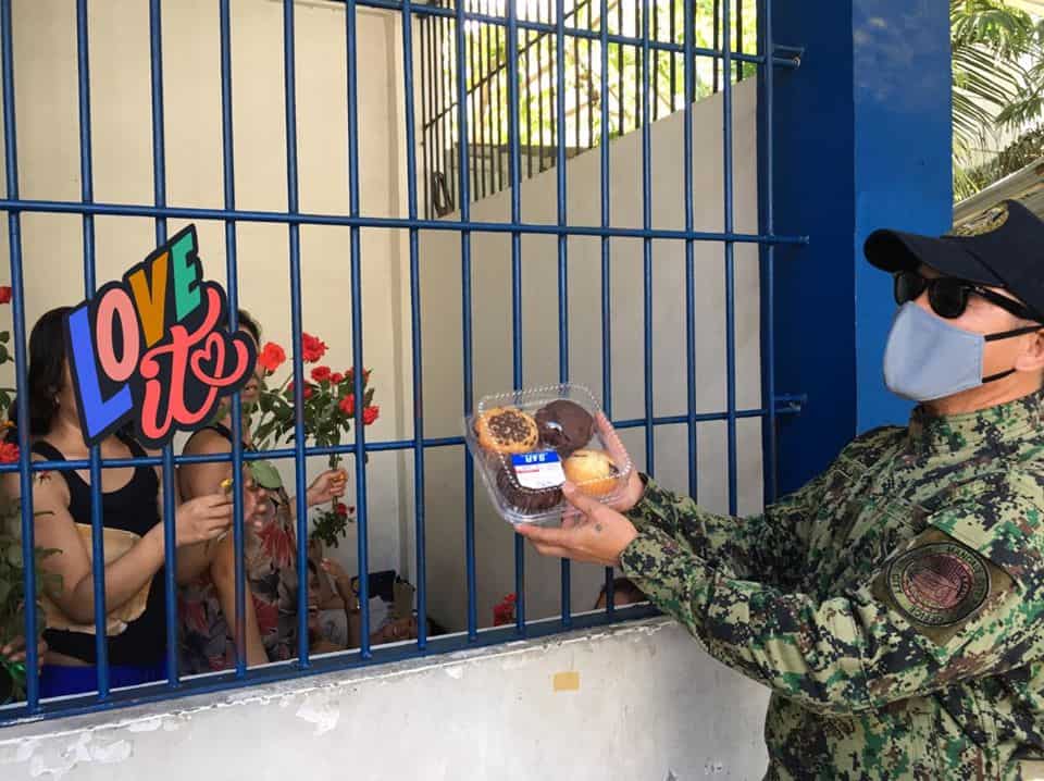 Police officers in Mandaue show compassion, gave detained mothers cakes and flowers during Mother's Day