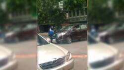 Video ng isang kotse na tatakasan sana ang nakaharang na traffic enforcer, viral