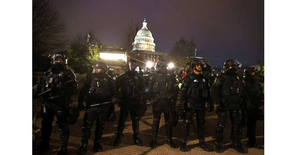 Woman shot dead as Trump supporters storm US Capitol