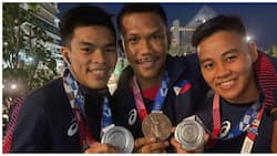 Boxing champs Eumir Marcial, Nesthy Petecio at Carlo Paalam na hawak ang kanilang medalya, viral na