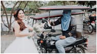 Bride na tumanggap ng parcel sa gitna ng wedding photoshoot, kinagiliwan online