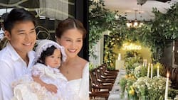 Photos from baby Felize McKenzie's flower-themed christening go viral