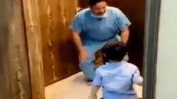 Video ng emosyonal na doktor na ‘di mayakap ang anak dahil sa pangamba sa COVID-19, nag-viral