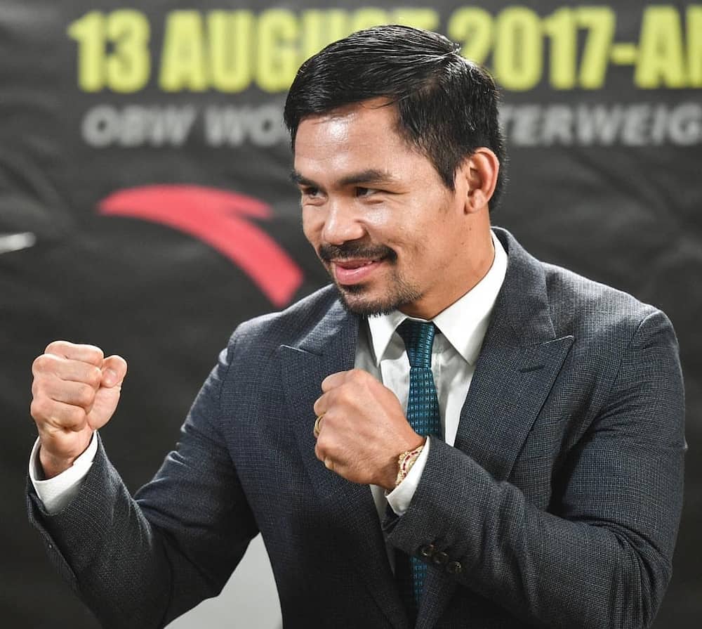 how old is Manny Pacquiao