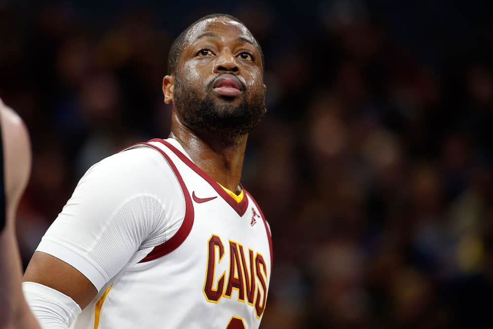 Dwyane Wade Shows Daughter Kaavia His Retired Jersey at Miami Heat