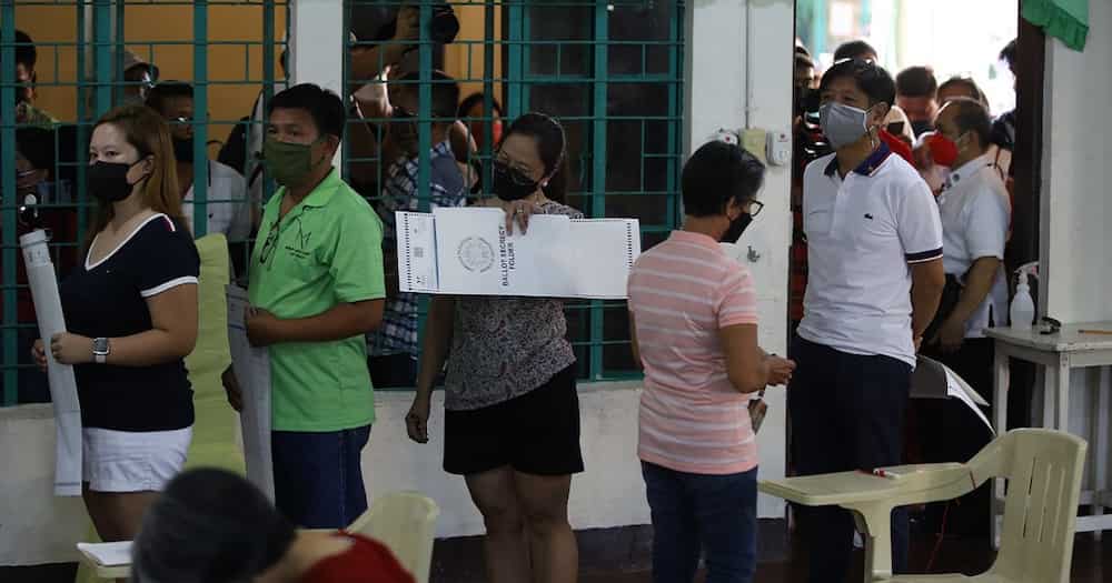 Bongbong Marcos gains praises for patiently lining up at voting precinct