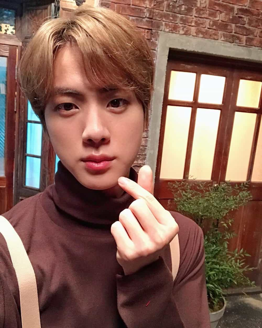 Jin BTS bio: net worth, family, age, real name, Instagram, and more