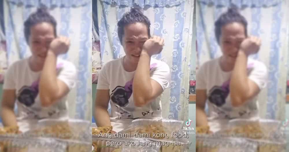 Video ng babaeng umiyak sa New Year dahil mag-isa lang siya pero andami niyang pagkain, viral