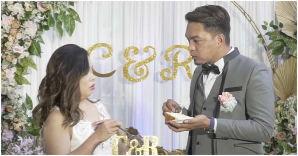 Reaksyon ng bride sa cake-cutting moment nila ng groom, kinagiliwan ng netizens