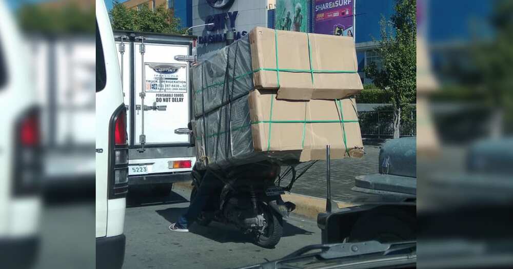 Photo of delivery rider with enormous package on motorcycle goes viral