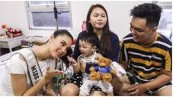 Netizens, may napansin sa larawan ni Catriona Gray at ng isang pamilya