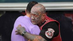 Photos of gang members consoling mourners after New Zealand mosque attacks go viral