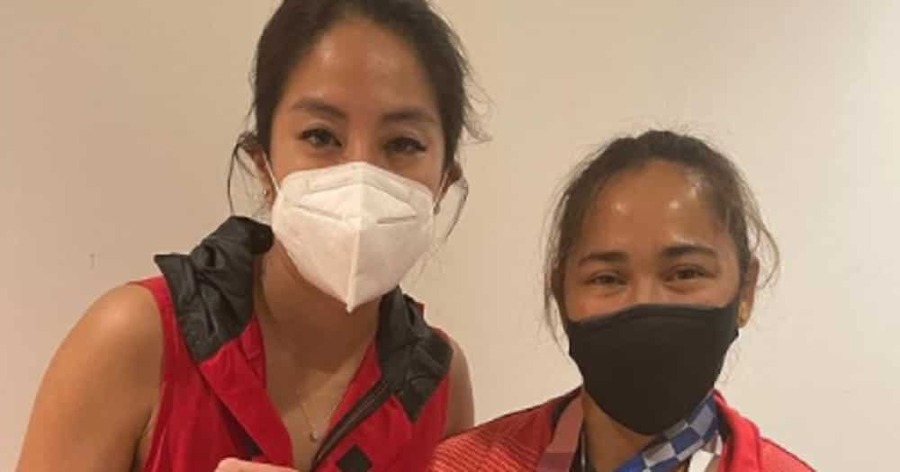 Gretchen Ho shows close-up of Hidilyn Diaz’s Olympic Gold Medal